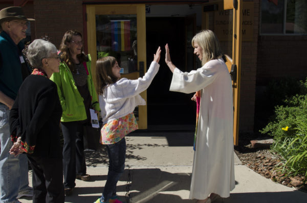 High five before Sunday Service